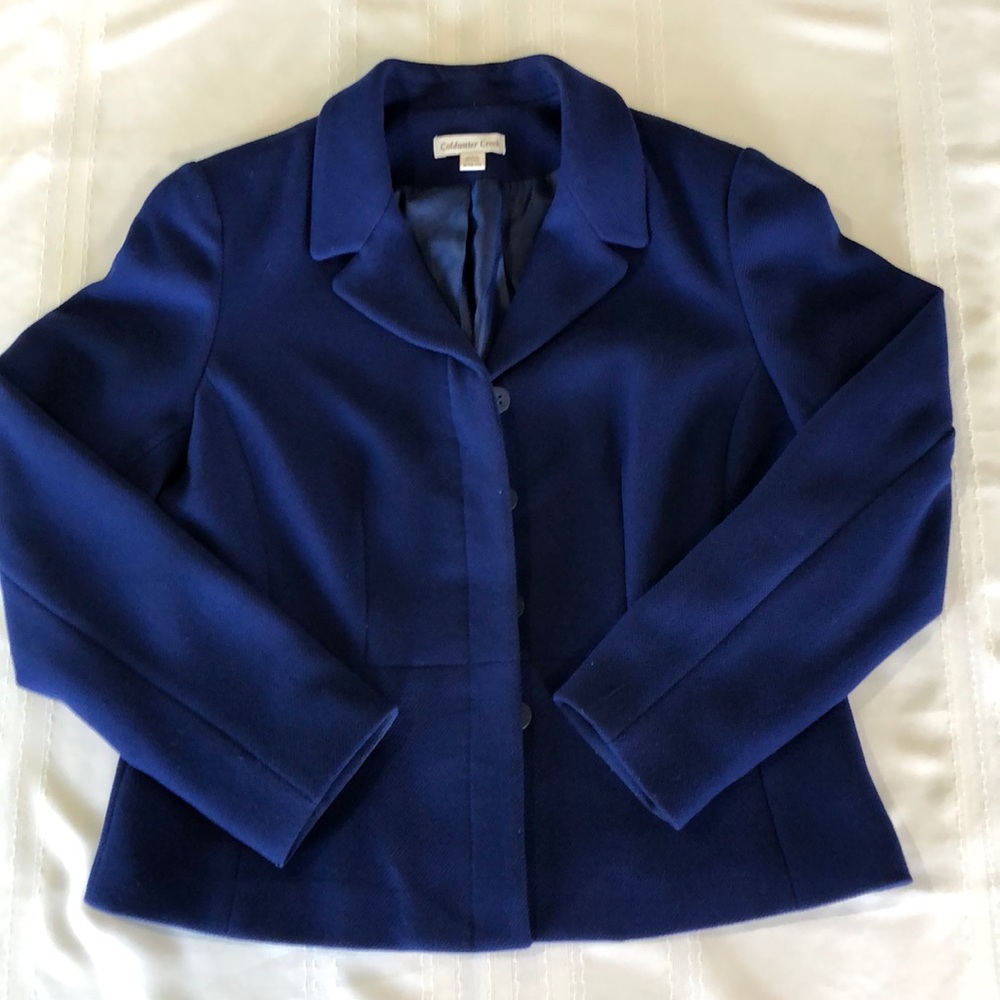 Beautiful fully lined blazer with hidden buttons.